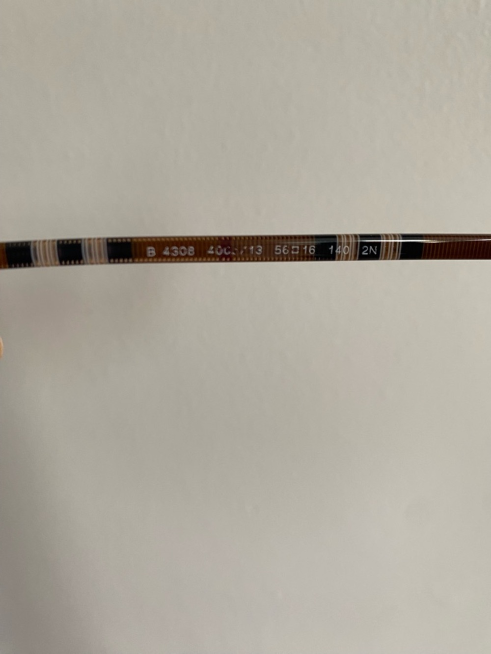 Burberry BE 4308 "Clare" sunglasses, characterized by their subtle cat-eye - Picture 6 of 7